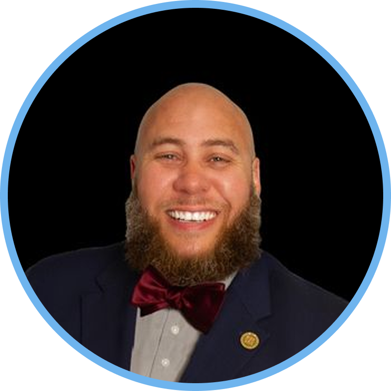 Hard hats on a construction site, representing workforce development, apprenticeship, and opportunity for justice-impacted talent.