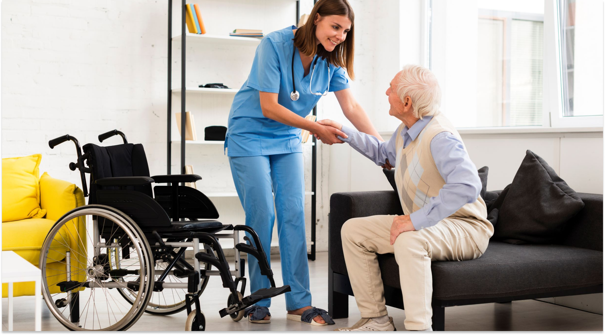 Image of nurse helping elderly man into a wheelchair. 